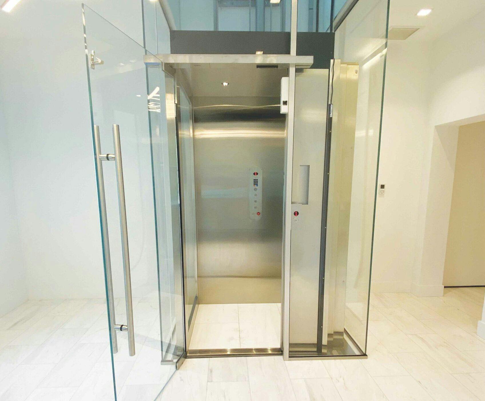 Symmety Custom Home Elevator Stainless Steel Car in Glass Hoistway
